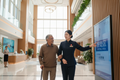 Bilingual medical escort helping foreign patient in Chinese hospital